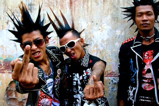 Goth punk guys giving the middle finger